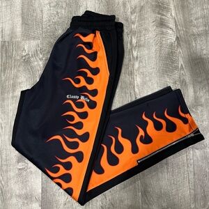 ADIKA ‘FLAMING ZIPPER HEM SWEATPANTS’